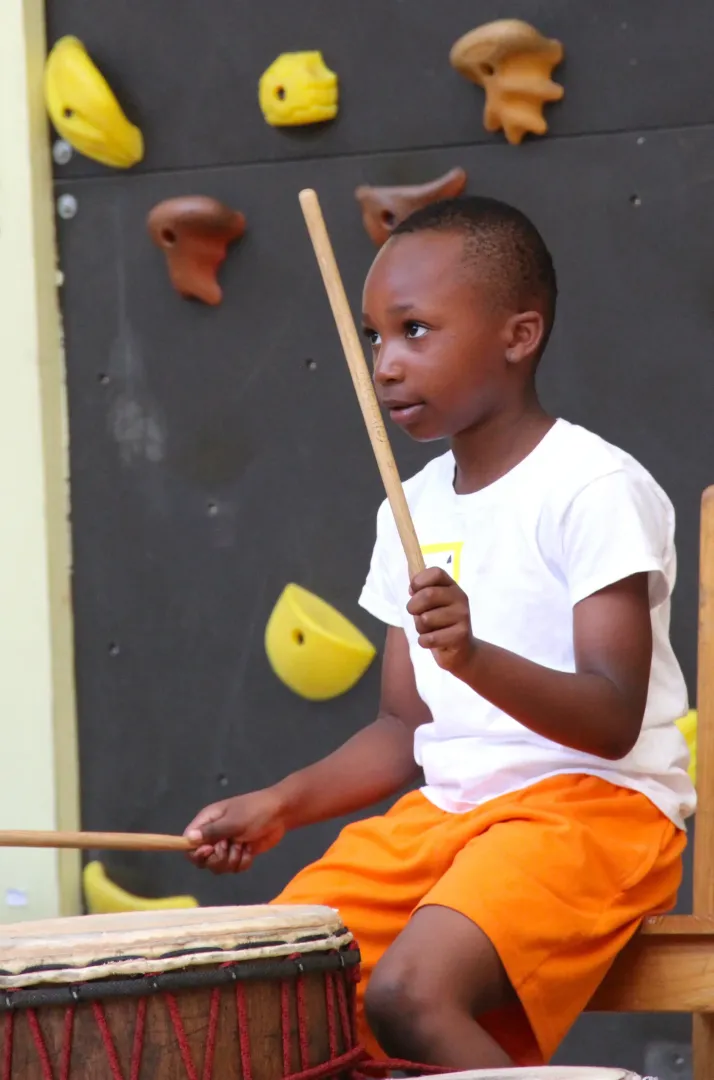 Child playing drums