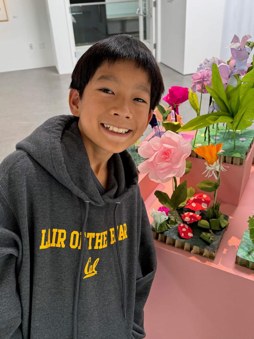 Child in front of artwork
